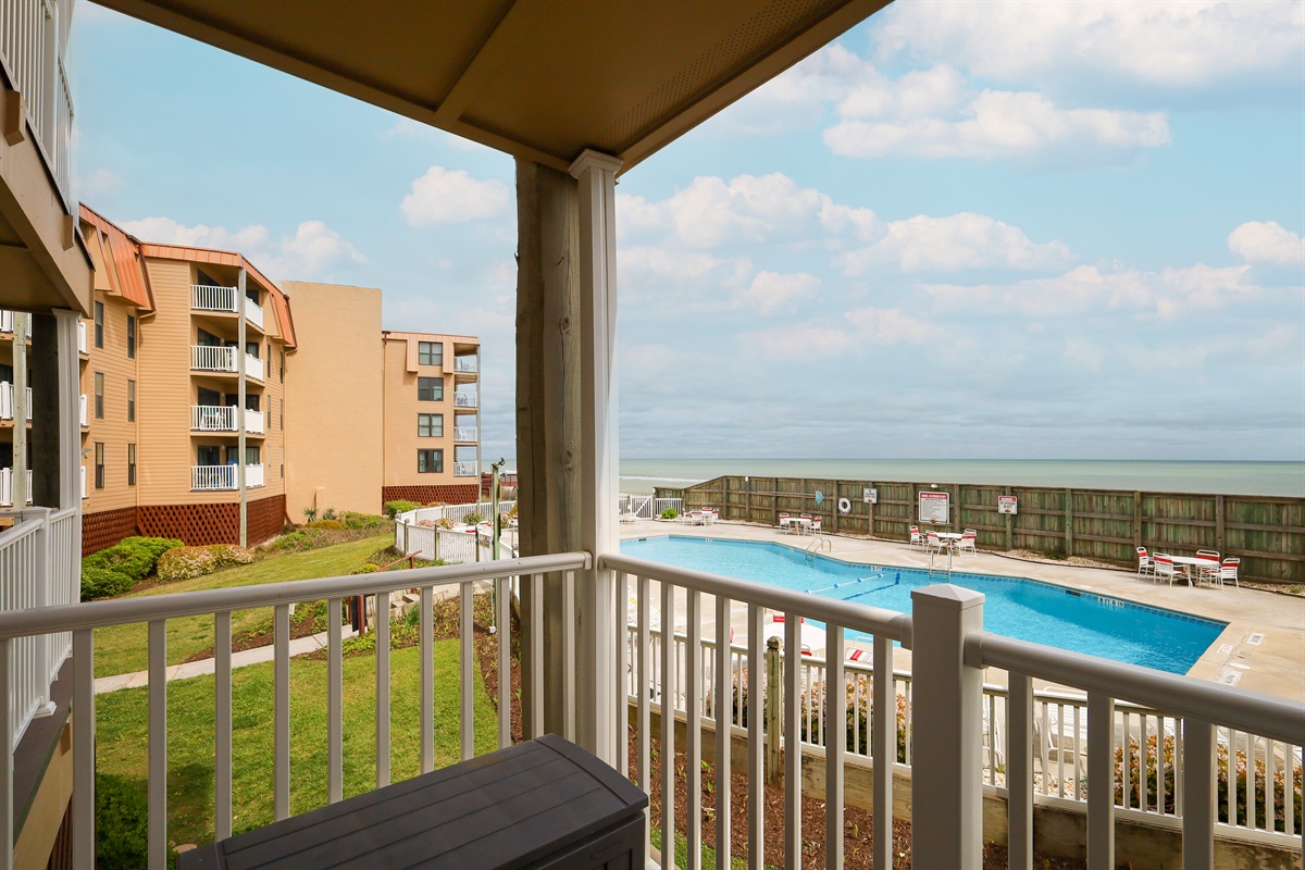 Overlooking the pool and the vast expanse of the ocean