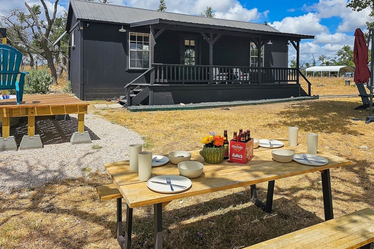 Enjoy al fresco dining with your favorite beverages at this charming picnic spot.