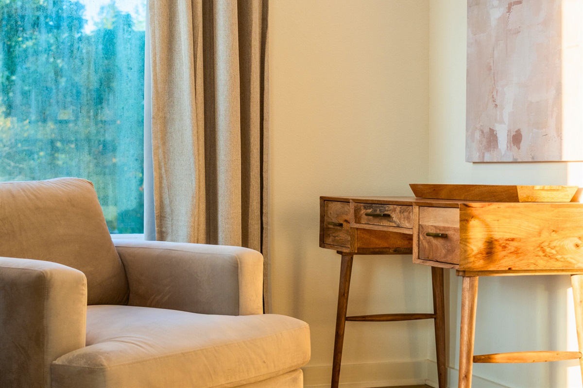 Quiet reading corner or workspace with natural light and calming tones&mdash;perfect for relaxation or focus.