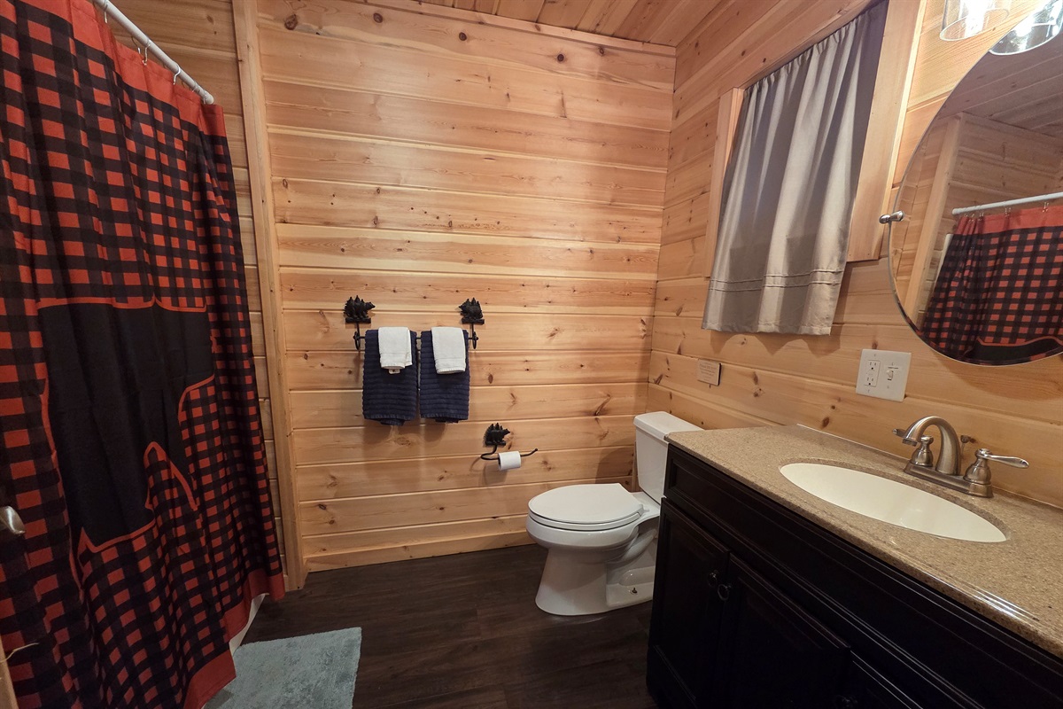A full bathroom is located on the main level.