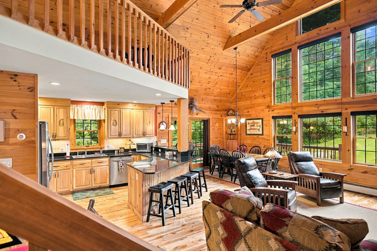Beautiful woodwork and abundant windows bring Adirondack warmth and natural light into the home.
