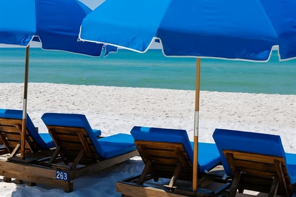 One set of beach service comes with in season   2 chairs 1 umbrella