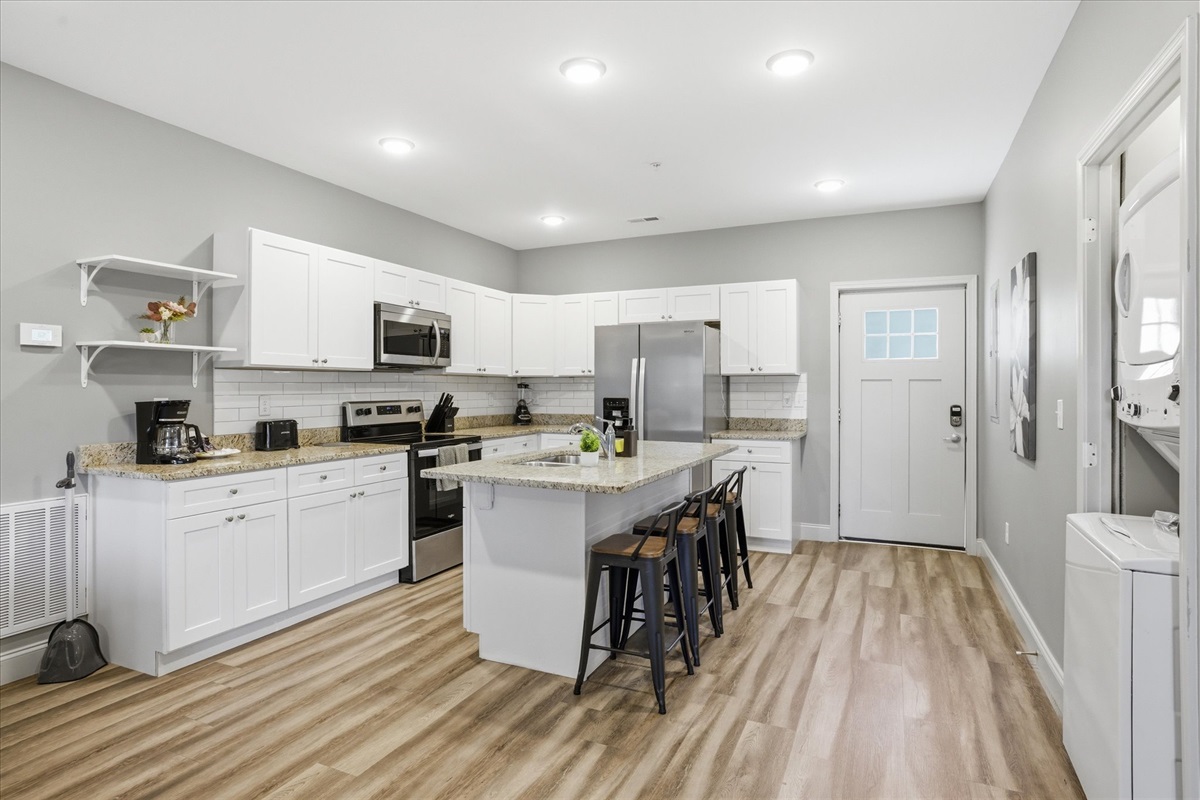 Walking into Unit 2, everything lines up—front door, kitchen, and living space all in view. It’s an easy layout to figure out, and even easier to settle into.