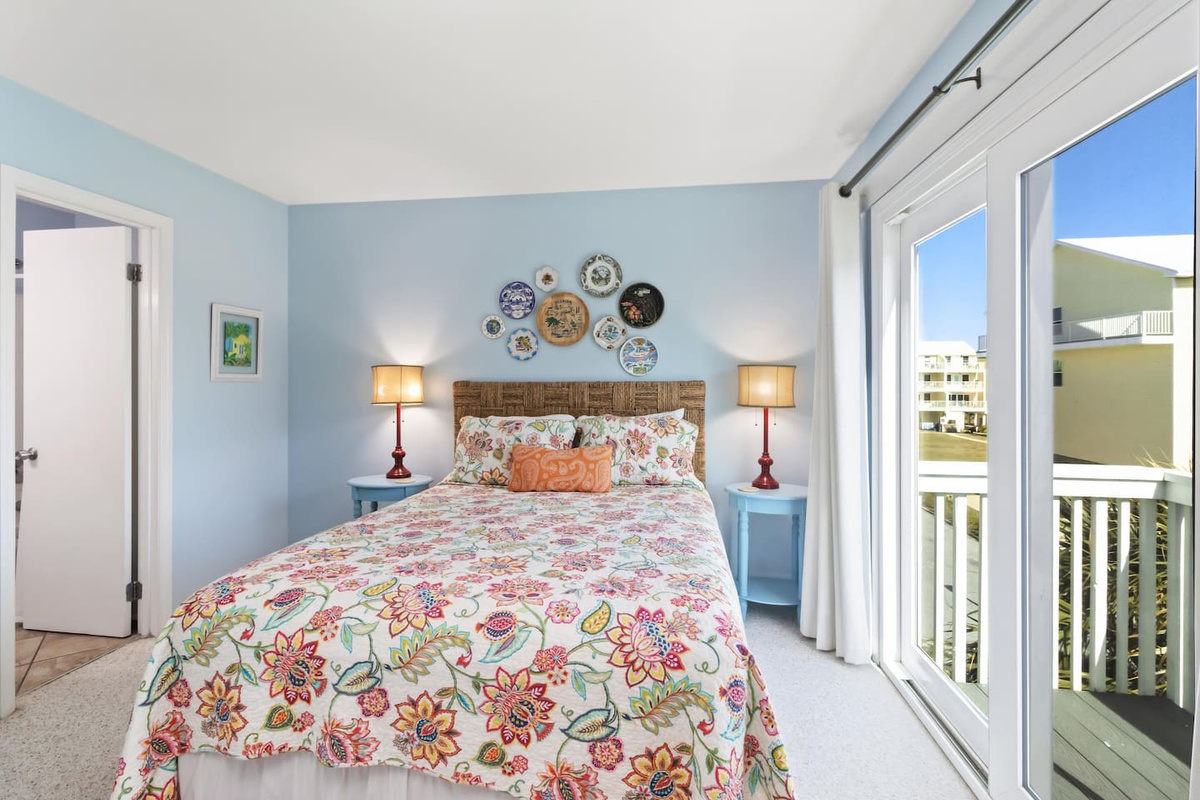 Step out to the queen suite's private balcony for a quiet morning &mdash; your guests get their own outdoor space too.