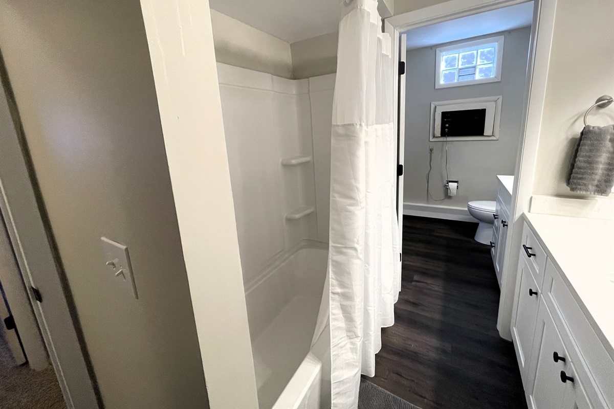 Full bath with full size tub/shower combo