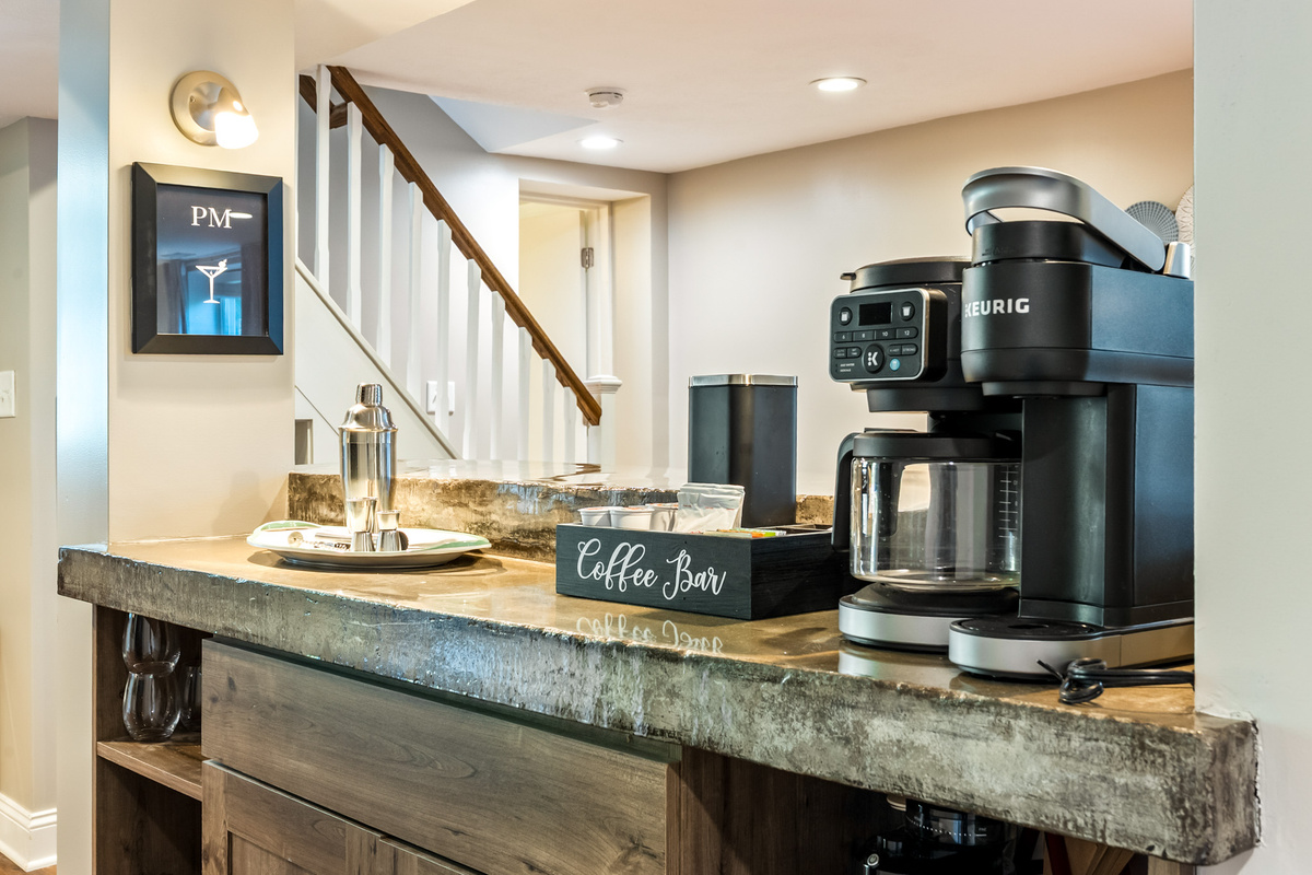Fuel your morning. The garden suite has a Coffee Bar with Keurig, drip and pour over coffee, and electric hot water kettle. The provided "starter pack" includes K-cups, coffee beans, assorted teas, sweeteners, and creamer.