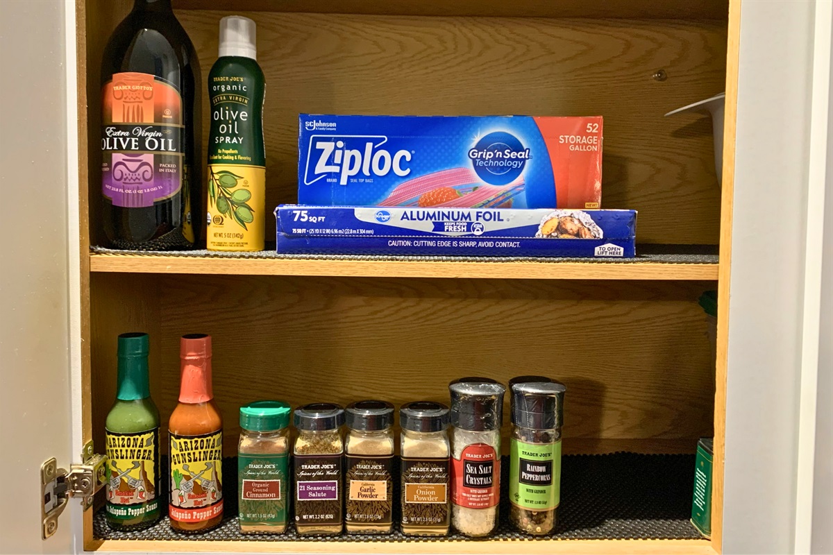 Well-stocked pantry with spices, oils, and essentials for home-style meals. 