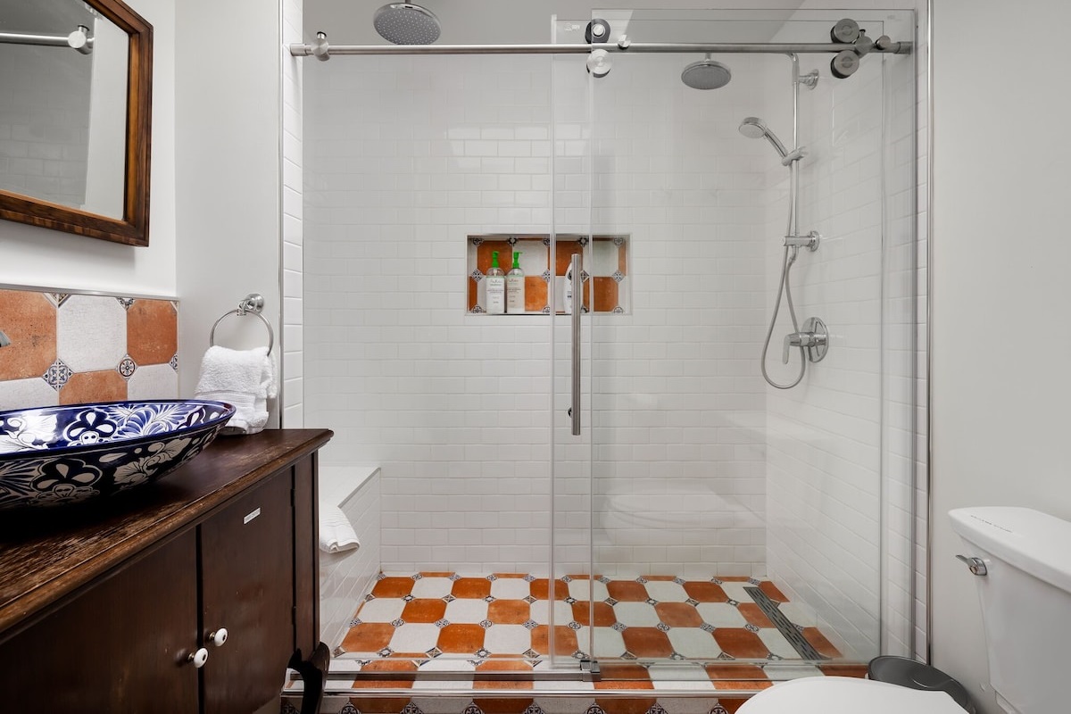 Oversized shower with three shower heads