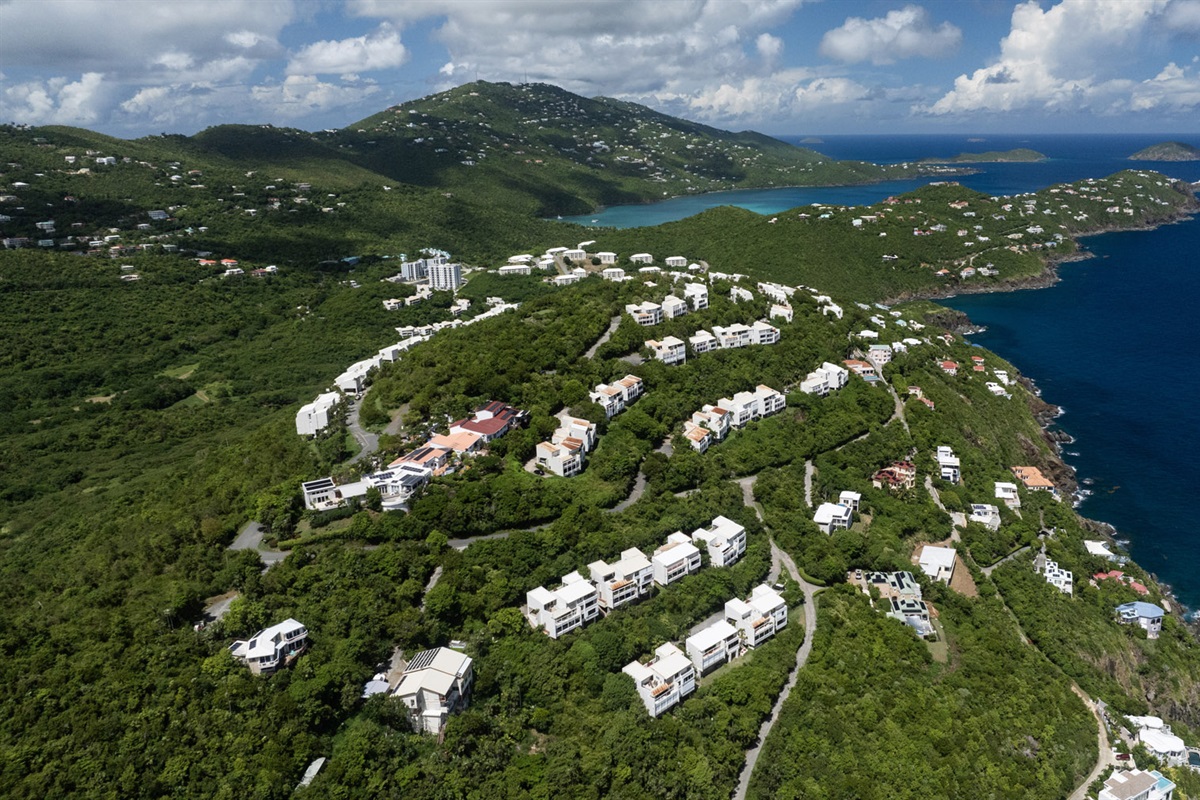 Discover your hilltop escape, where the ocean meets the sky.  The turquoise water in the background is Magen's Bay, only a short five minute drive away.