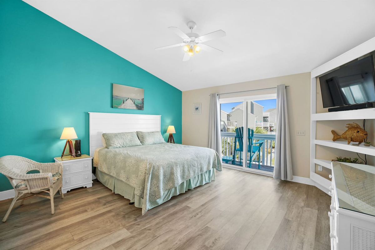 Claim the king master suite and set the tone for your whole stay &mdash; this is how beach vacations should start.