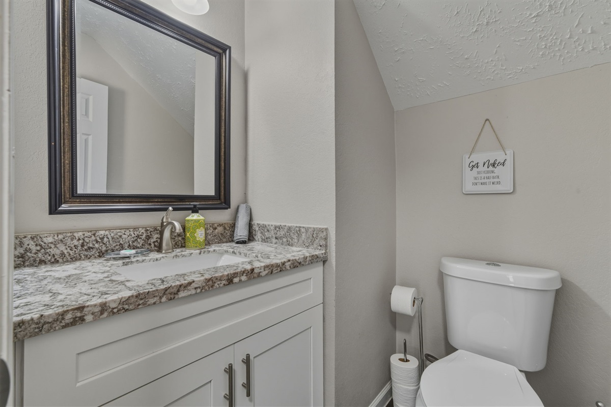 Half bathroom designed for group convenience.