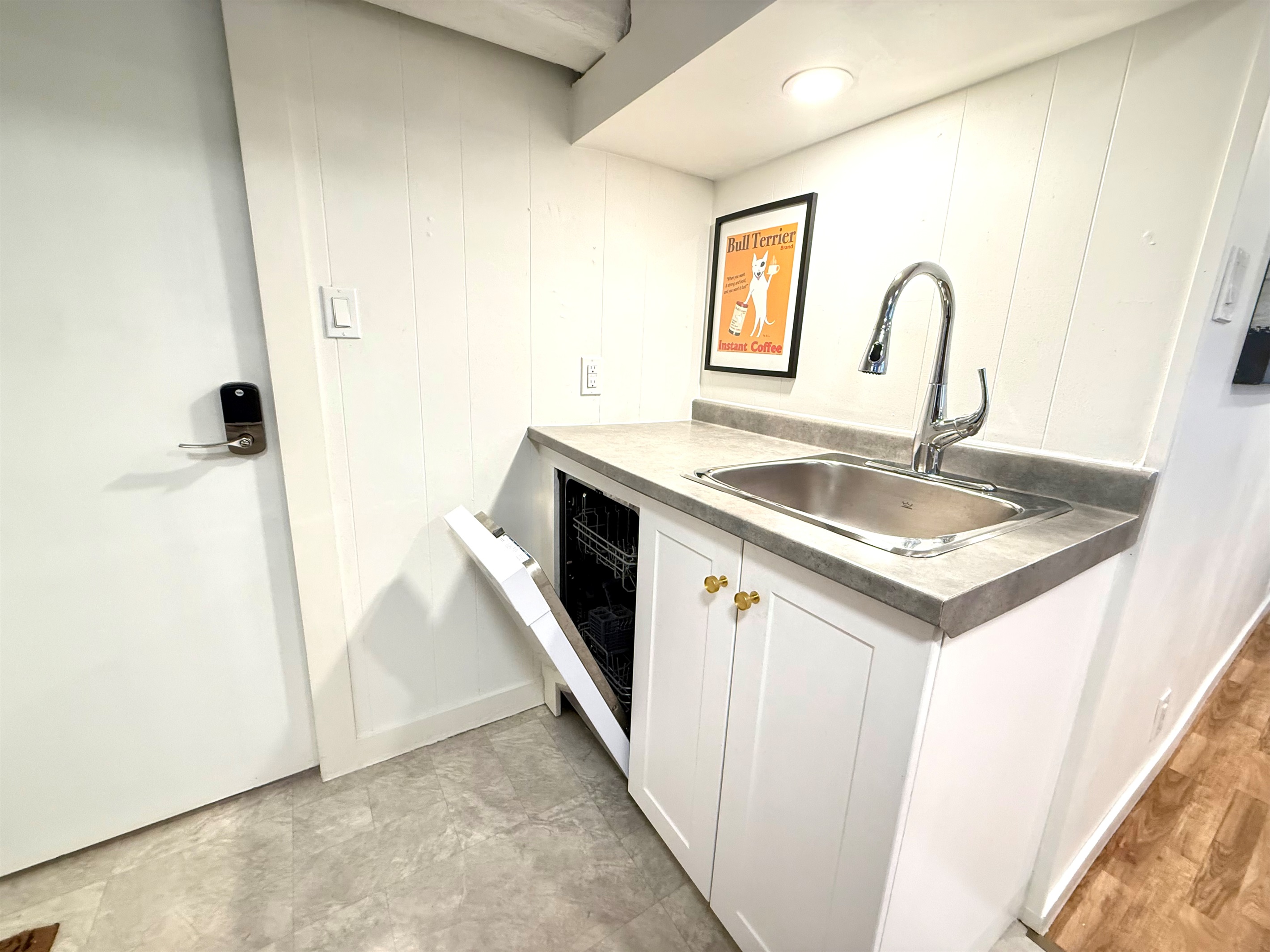 Sink with dishwasher for easy clean-up during your stay.