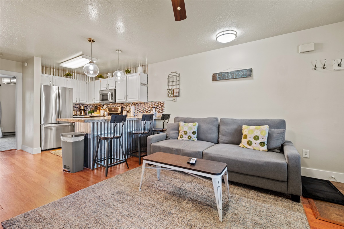 Spacious main living area with fireplace, Smart TV, and comfortable furnishings.