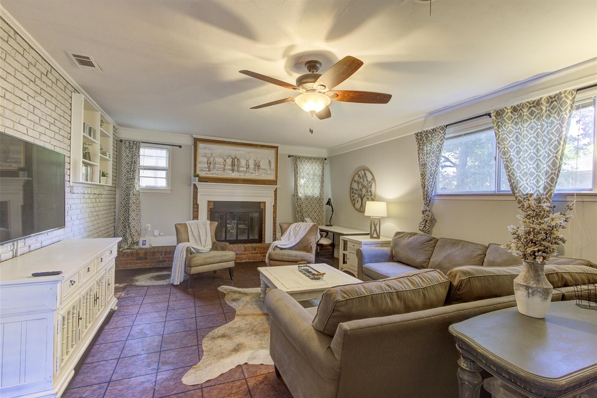 Spacious 2nd living room with desk, TV, and full size pull-out sofa bed