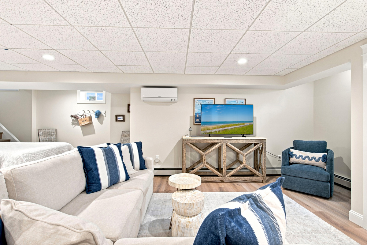 Stretch out and unwind in the spacious lower-level lounge, complete with comfortable seating and a TV.