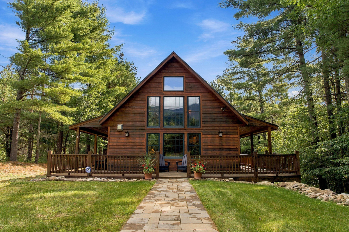Welcome to Whiteface View Lodge, a private Adirondack retreat with incredible views of Whiteface Mountain. (Note the reflection in the windows)