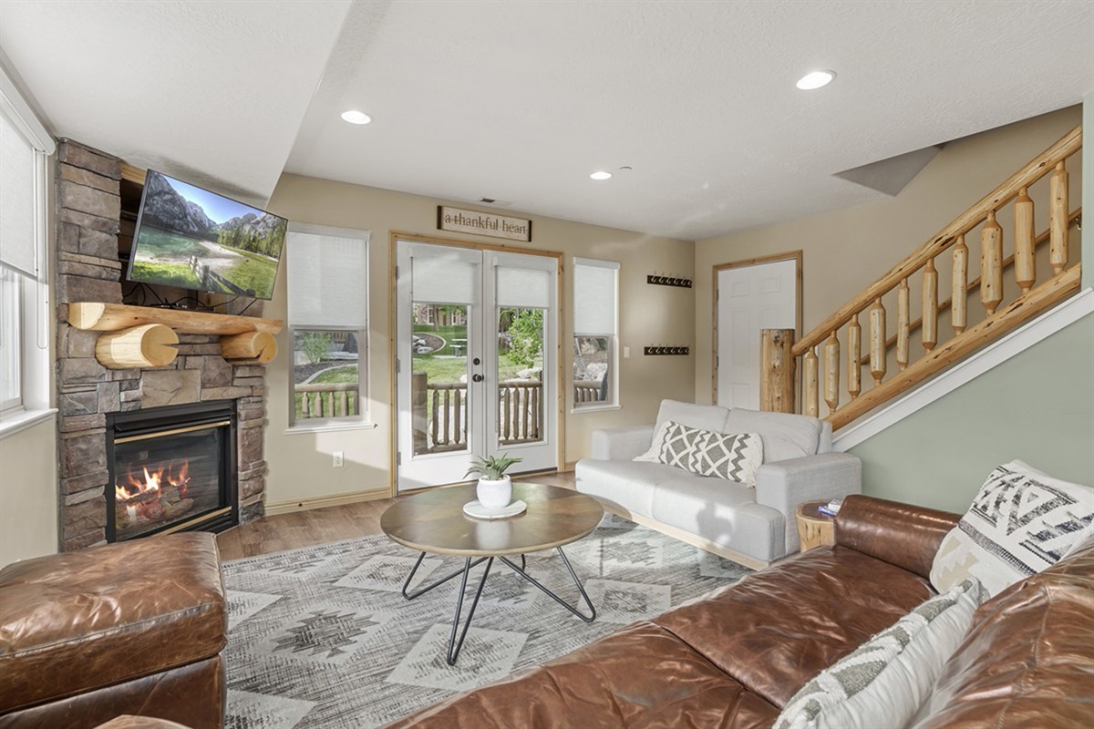 A warm and inviting living space with a cozy fireplace—perfect for relaxing after a day of exploring.