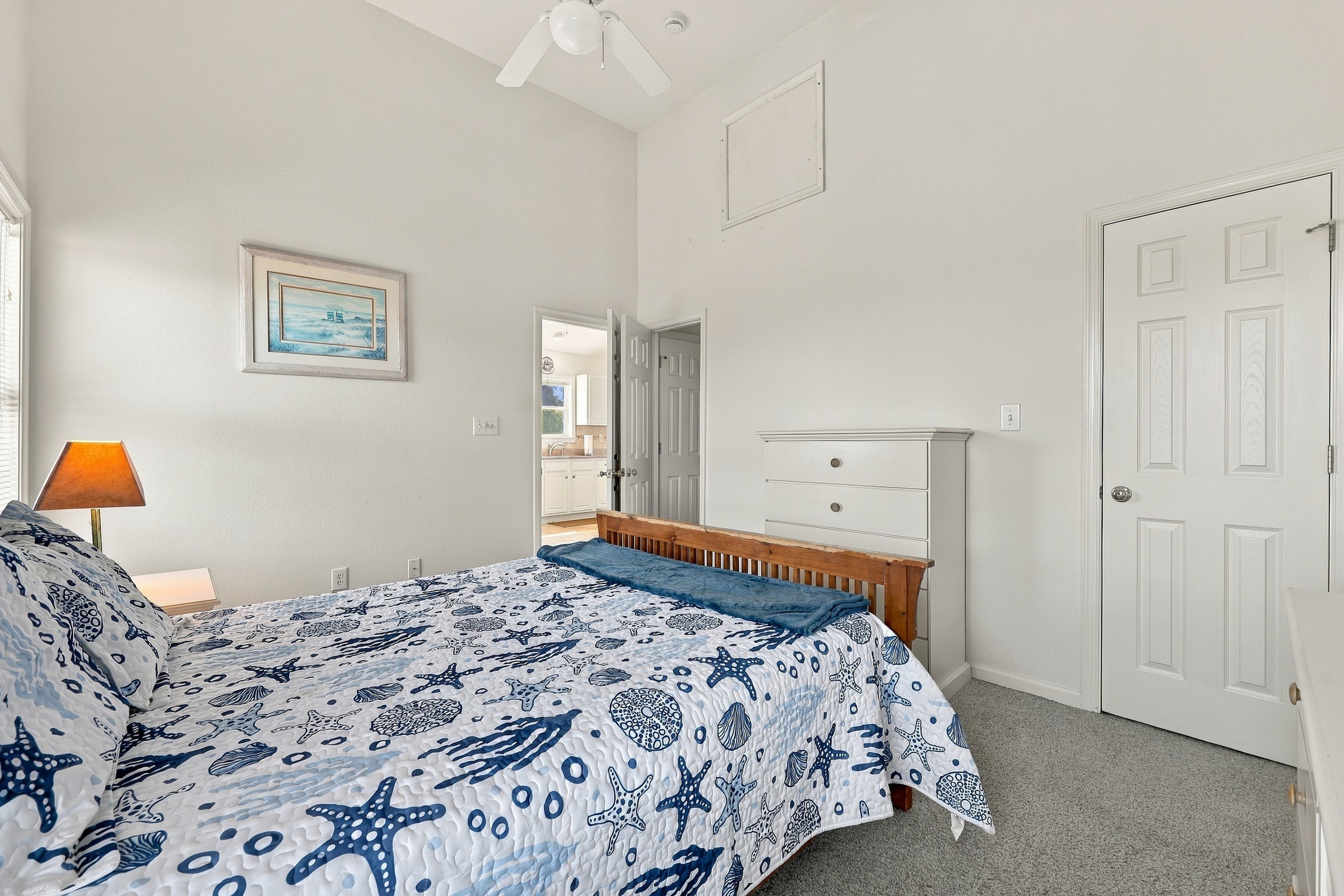 Starfish, shells and sunshine set the tone in this bedroom.