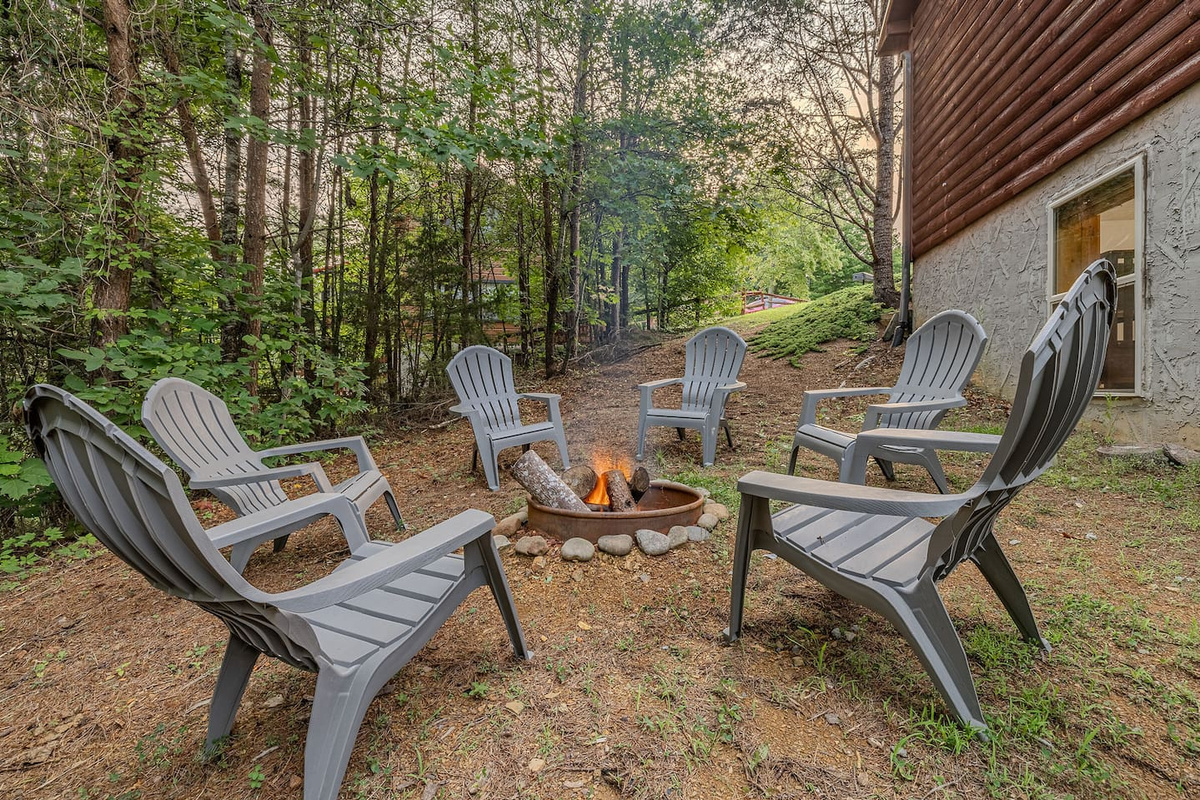 Outdoor fire pit perfect for roasting marshmallows, sharing stories, and enjoying cool Smokey Mountain evenings.