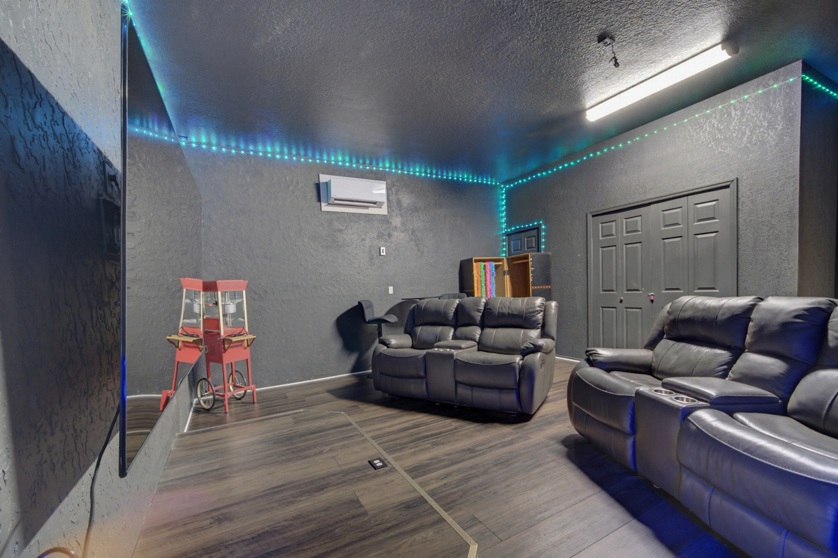 Fully air conditioned game room w/ karaoke stage, 85" TV, and plenty of seating