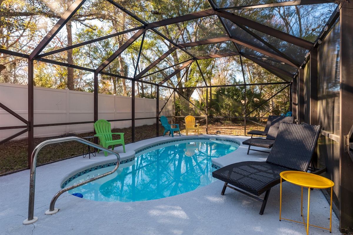 Beautiful outdoor pool inside the connect lanai. Three sun-loungers and side tables, perfect for pool-side book reading or sunbathing!