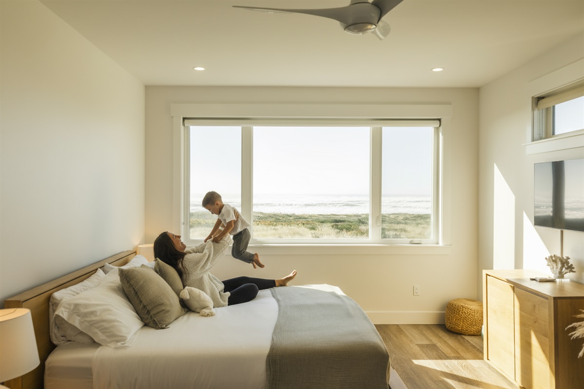 {Upstairs Bedroom} A cozy space featuring a king bed and a pull-out Queen sofa for added comfort.