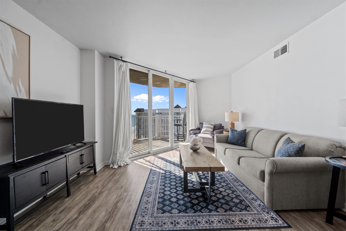 Sun-filled living room with private balcony