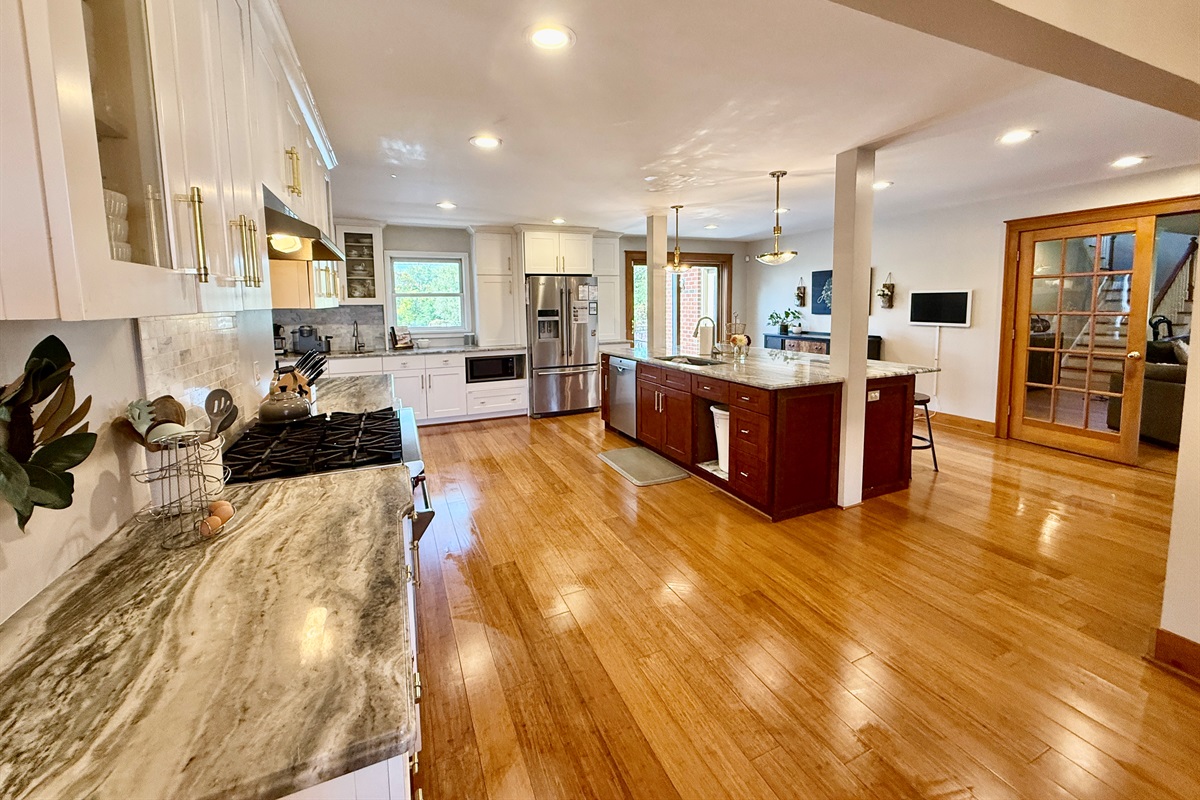 Chef's Kitchen! Huge Island, Beverage Center, Wolf Range and Butlers Kitchen with 2 additional ovens.