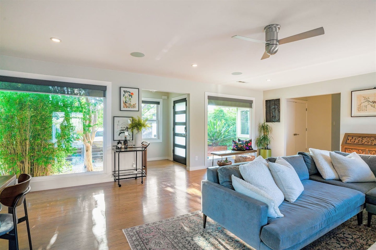 Living area with smart tv and fireplace.