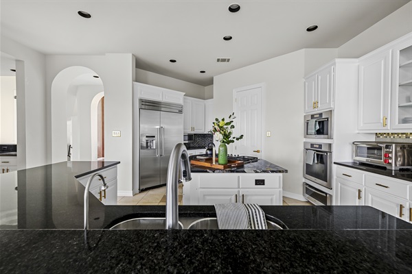 Appliances Include: Miele Gas Cooktop / Miele Oven /  Miele Steam Oven / Thermador Refrigerator / Wolf Toaster Oven.