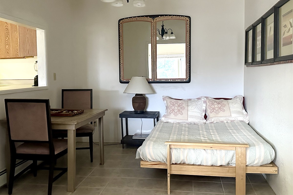 The nook off the kitchen has a small table that can be used for breakfast, studies, or games for two. It also has a double futon if you have additional people in your group who would like an additional bed.