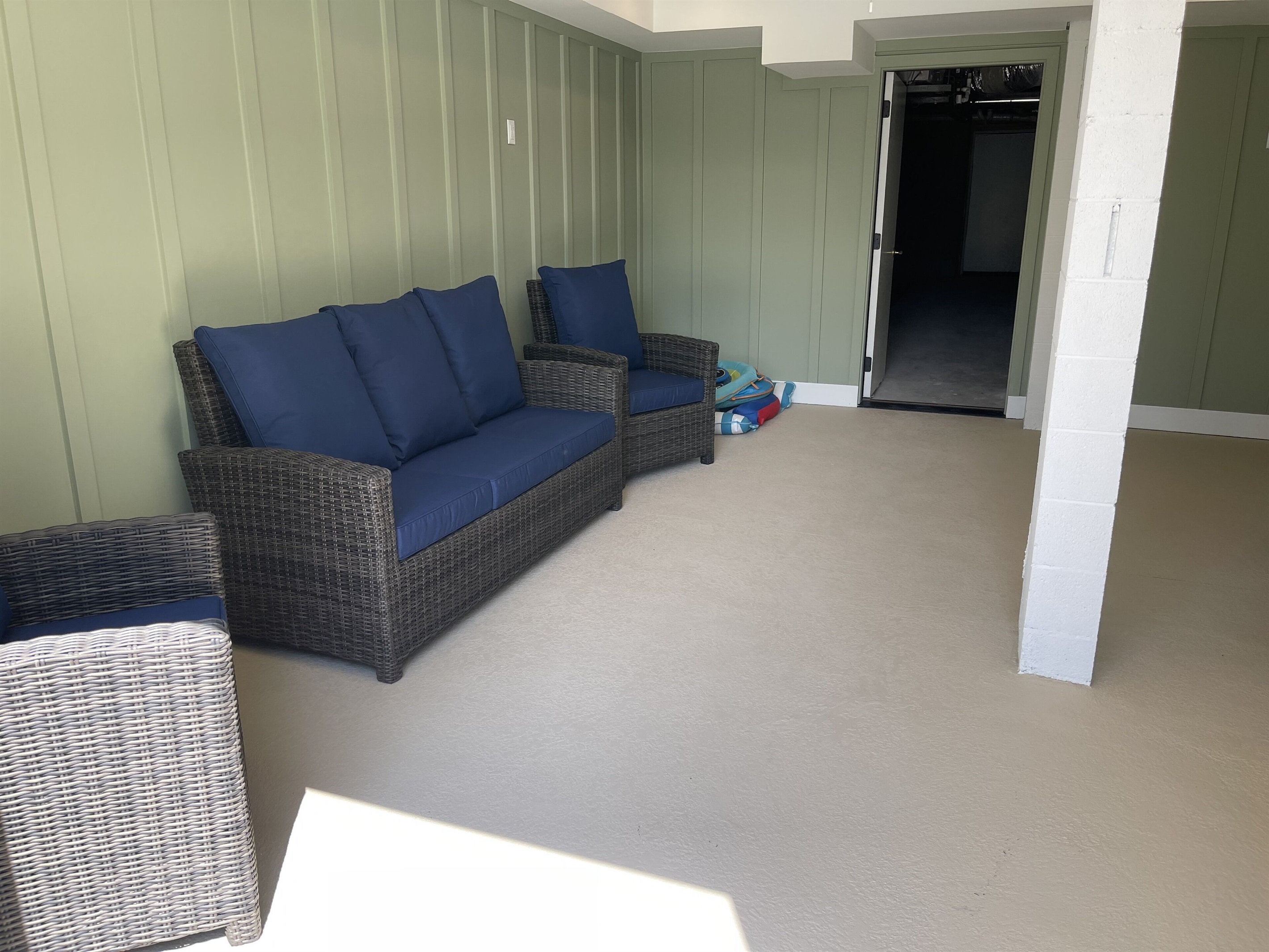 “Chill lounge” next to pool deck for when you want to escape the heat & watch TV