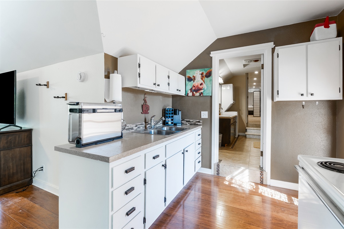 Kitchen leads to the bathroom