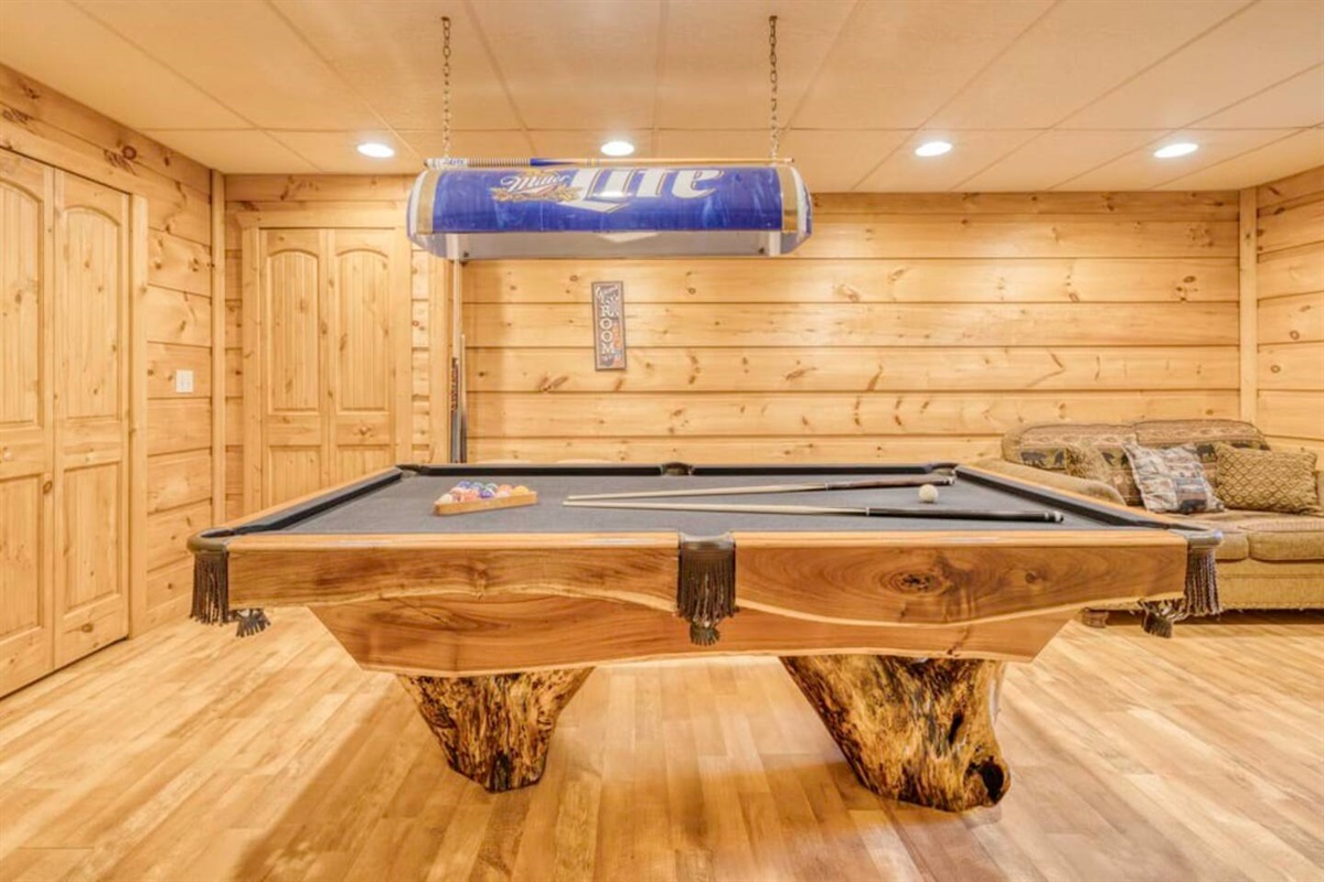 Indulge in a lively game of billiards within the cozy confines of the cabin!