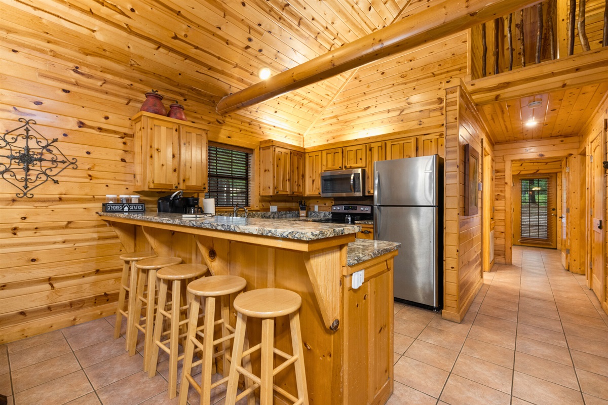 Bar seating in the kitchen for casual dining and morning coffee.