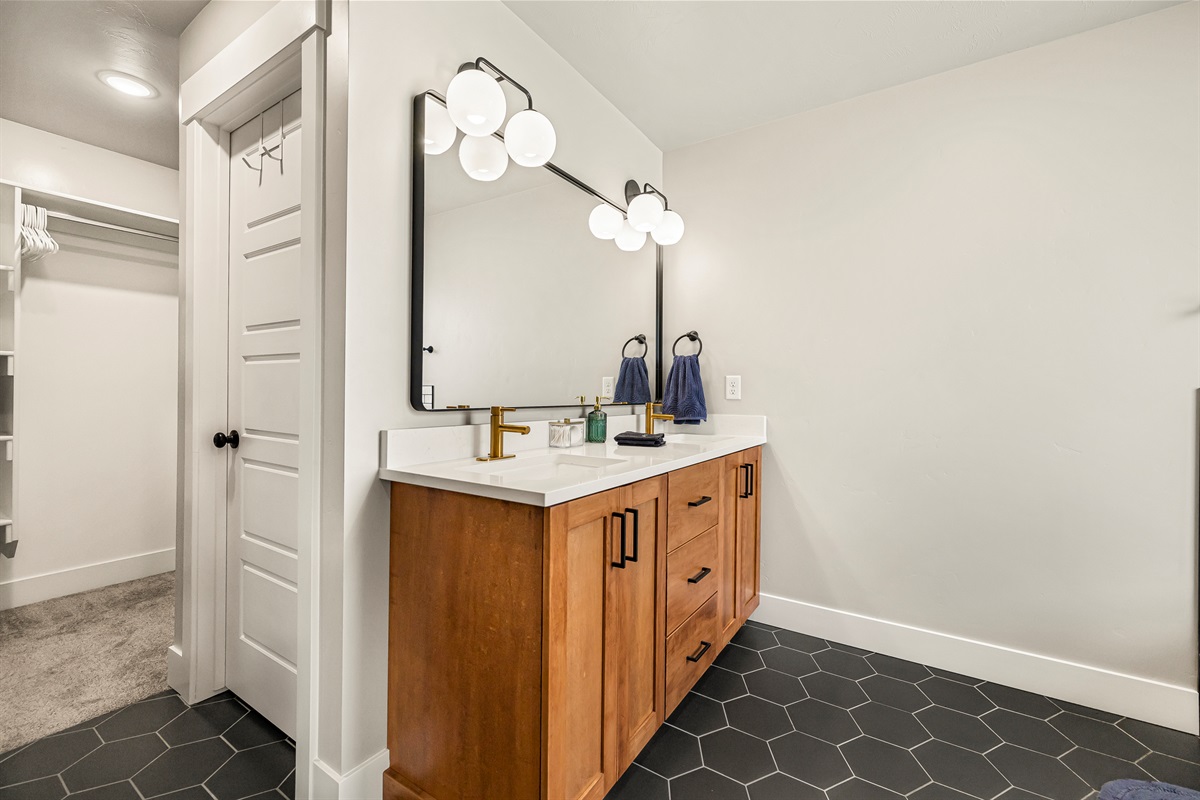 Master bathroom with entrance to walk in closet.