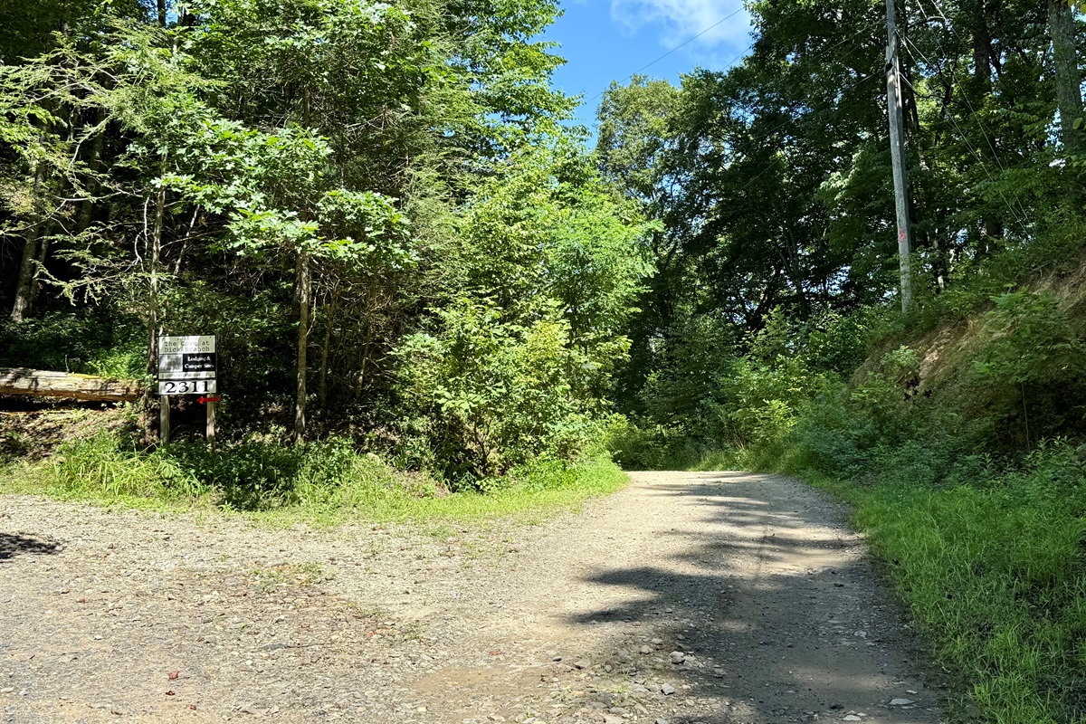 Turn left before the sign for fresh air, pasture views, and your perfect campsite. Do not pass the sign.