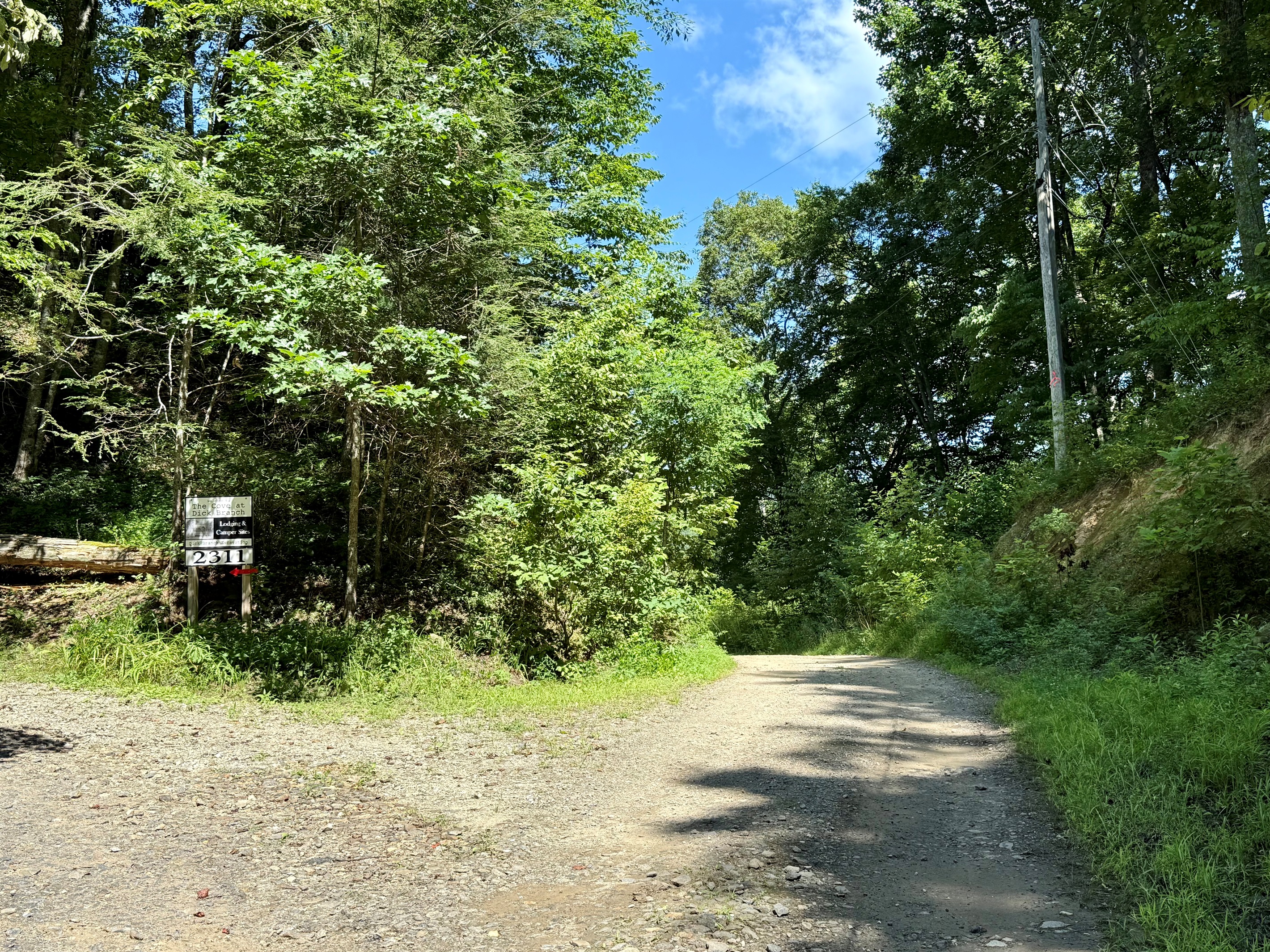 Turn left before the sign for fresh air, pasture views, and your perfect campsite. Do not pass the sign.