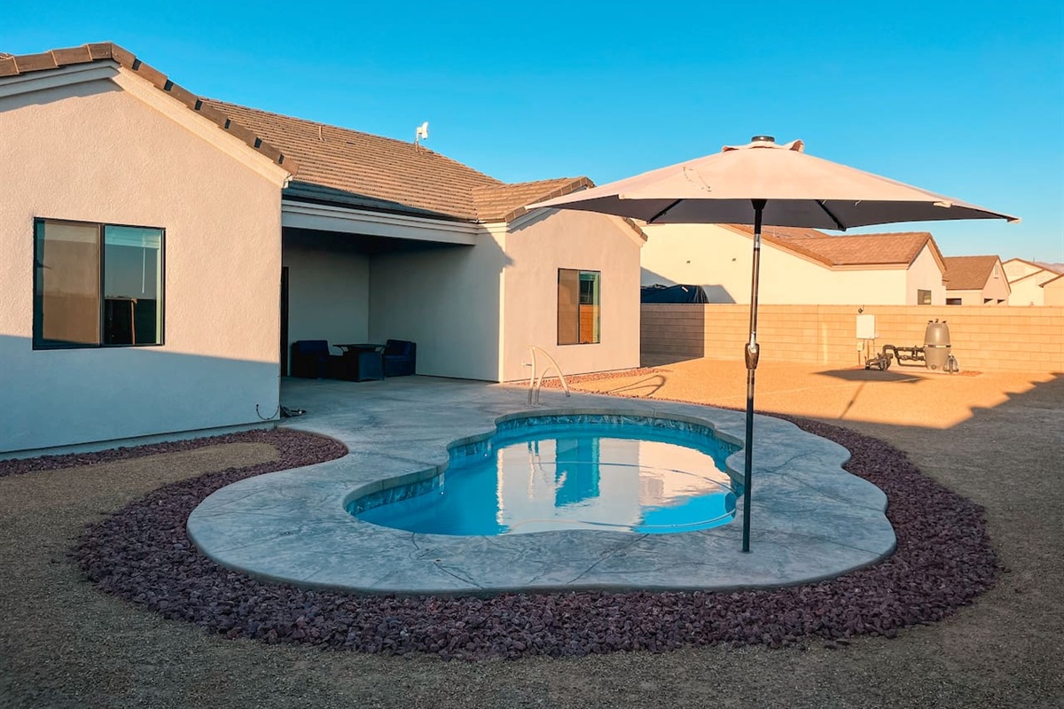 Private backyard pool. Perfect for relaxing and soaking up the sun