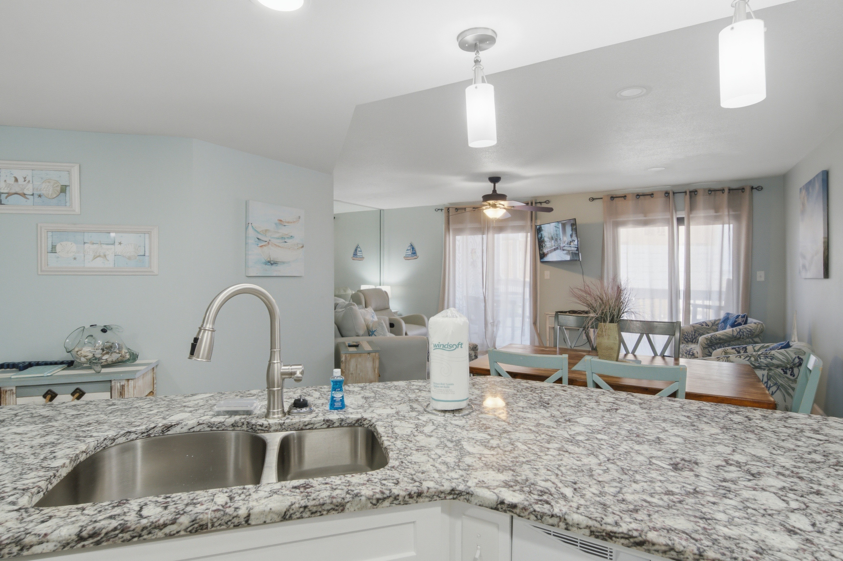 Deep kitchen sink with granite counters, steps from the breakfast nook