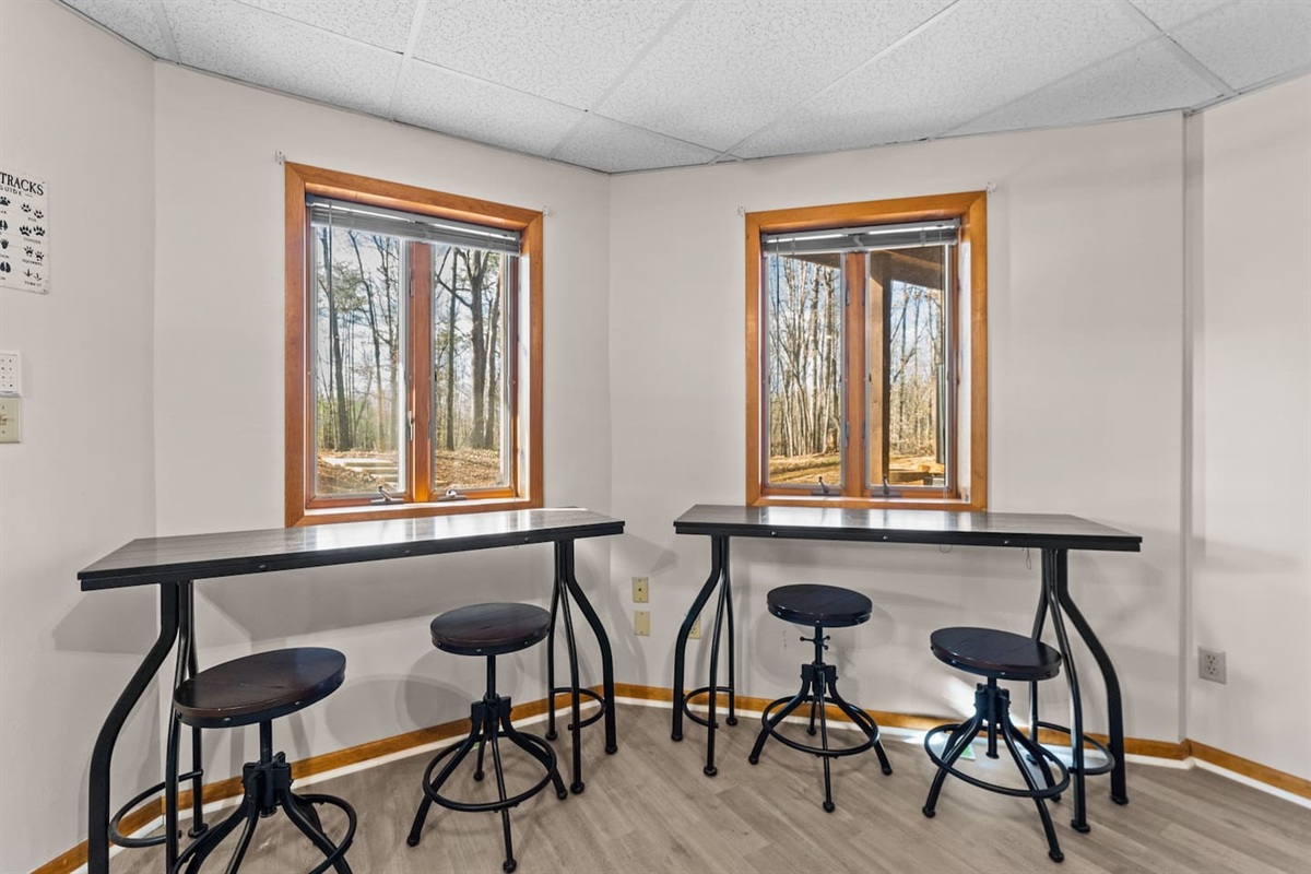 Dining Nook: Enjoy breakfast with a view through bright, double windows and stylish bar seating!