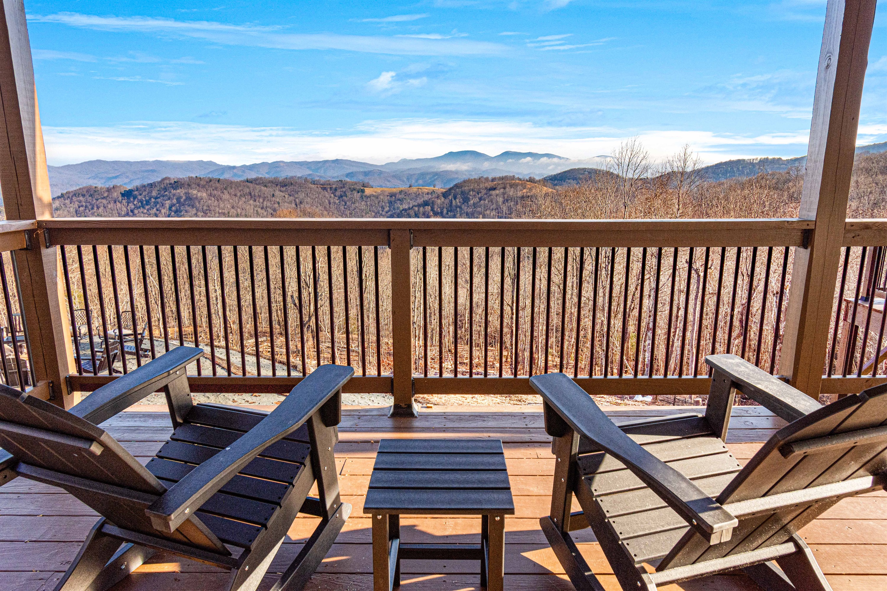 Off the "Bear Room" is adirondack seating on a covered upper deck offering a peaceful place to relax and take in sweeping mountain views.