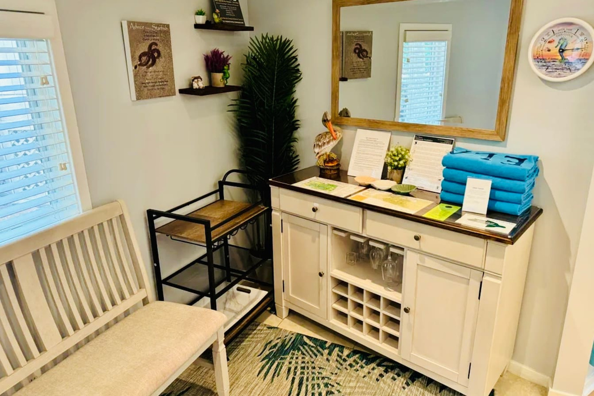 Entry with beach towels and storage