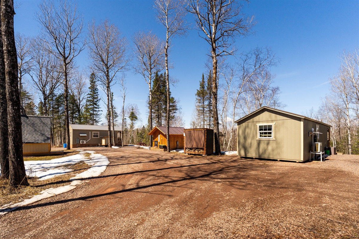 From left to right: Shared Outhouse, Cabin 1, Shared Sauna in the middle, Cabin 2 (also a rental) on the right