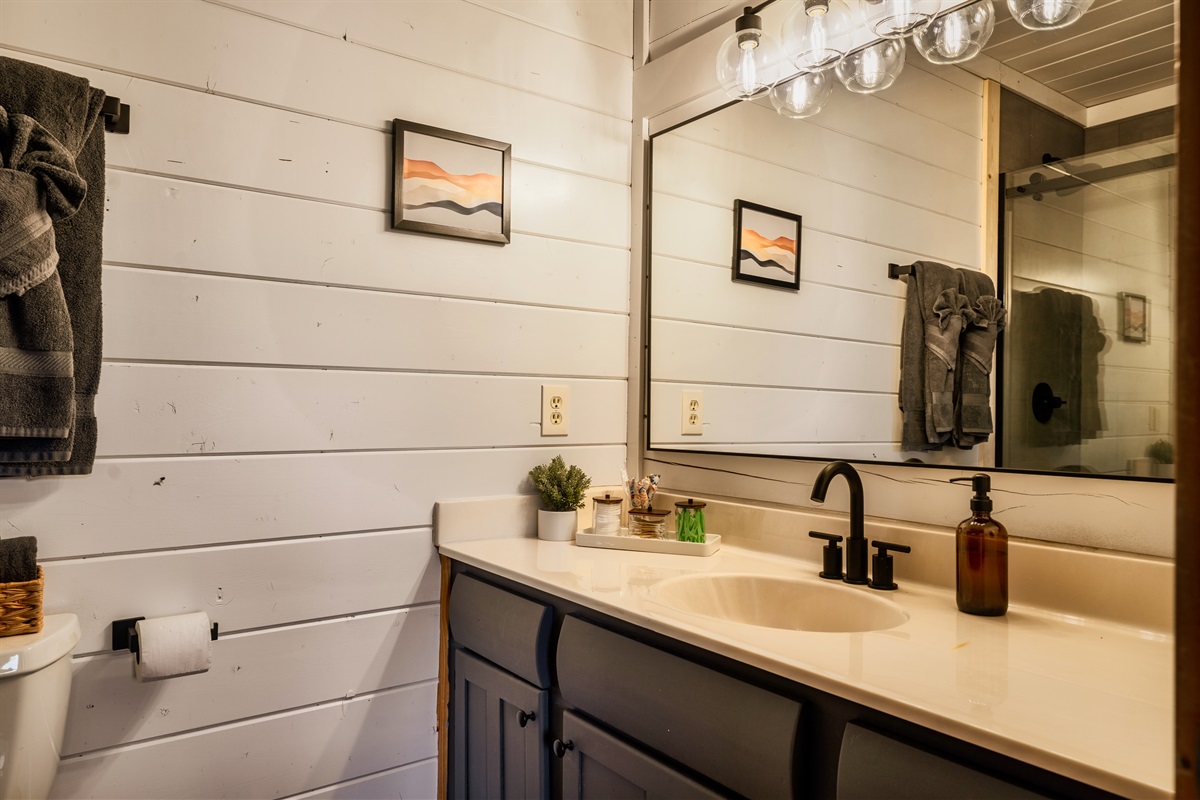 Morning rituals made delightful! Embrace the natural glow at our vanity area in the bathroom.