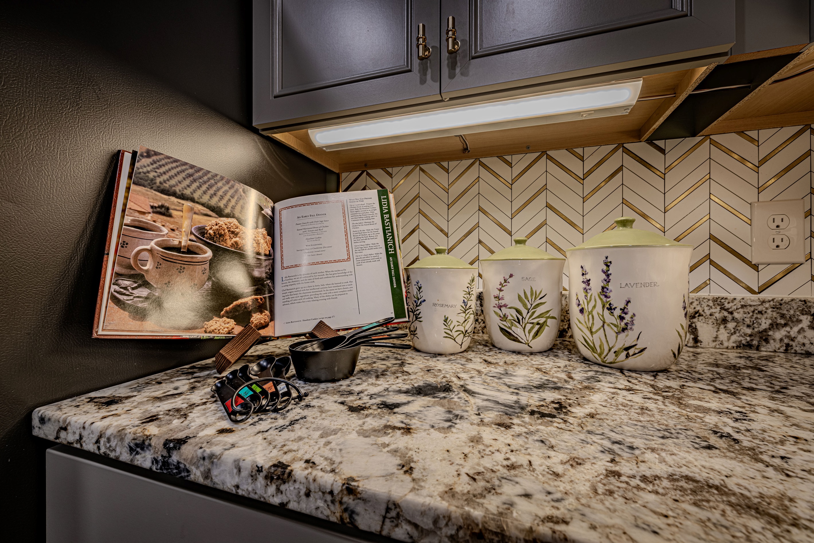 Find culinary inspiration in a kitchen designed for home-cooked memories. This charming corner blends artistic flair with every essential for a perfect mountain meal.