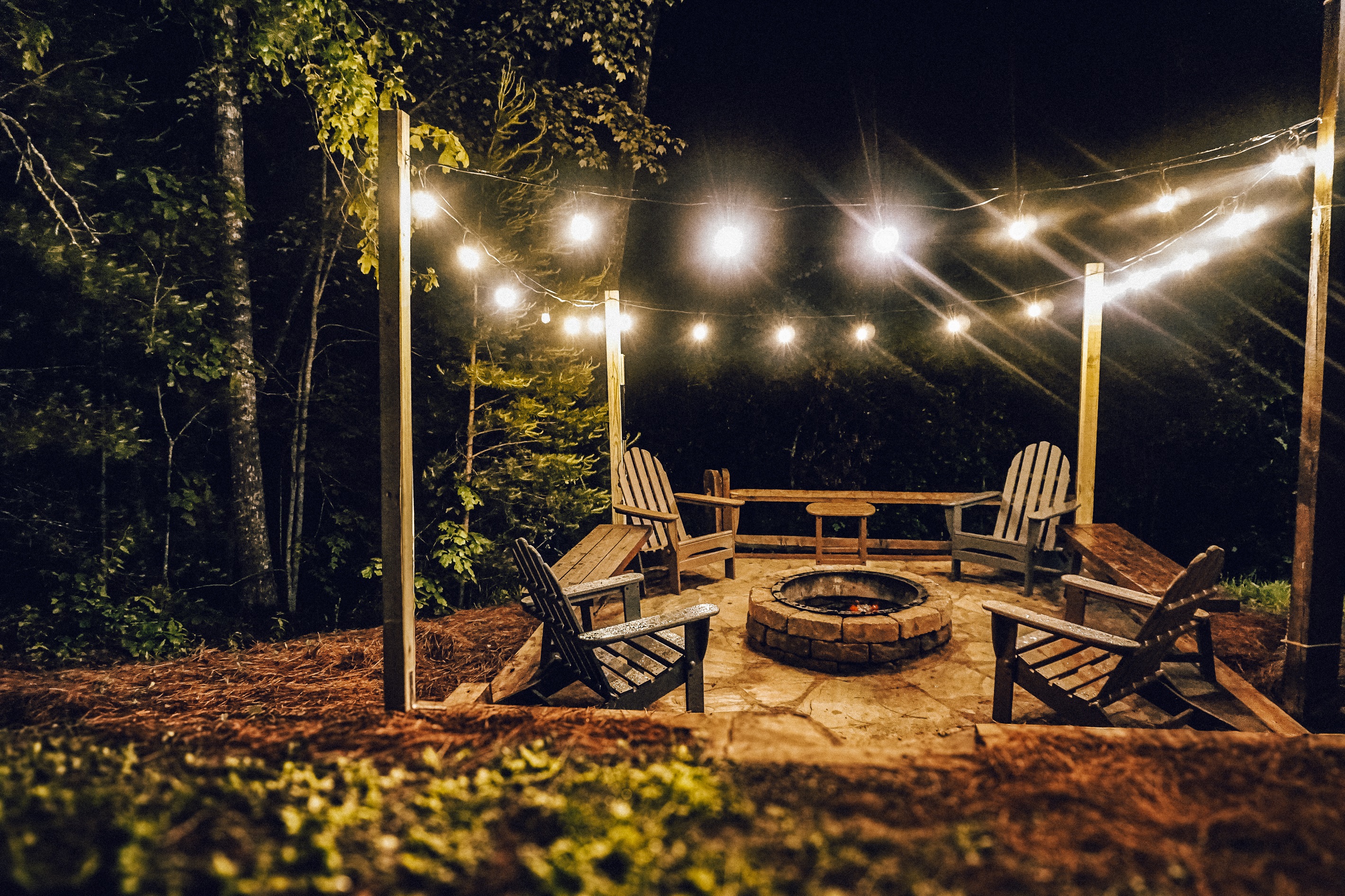 Lower-level deck with quick access to the firepit - perfect for s’mores, relaxation, and star-filled nights in the mountains.
