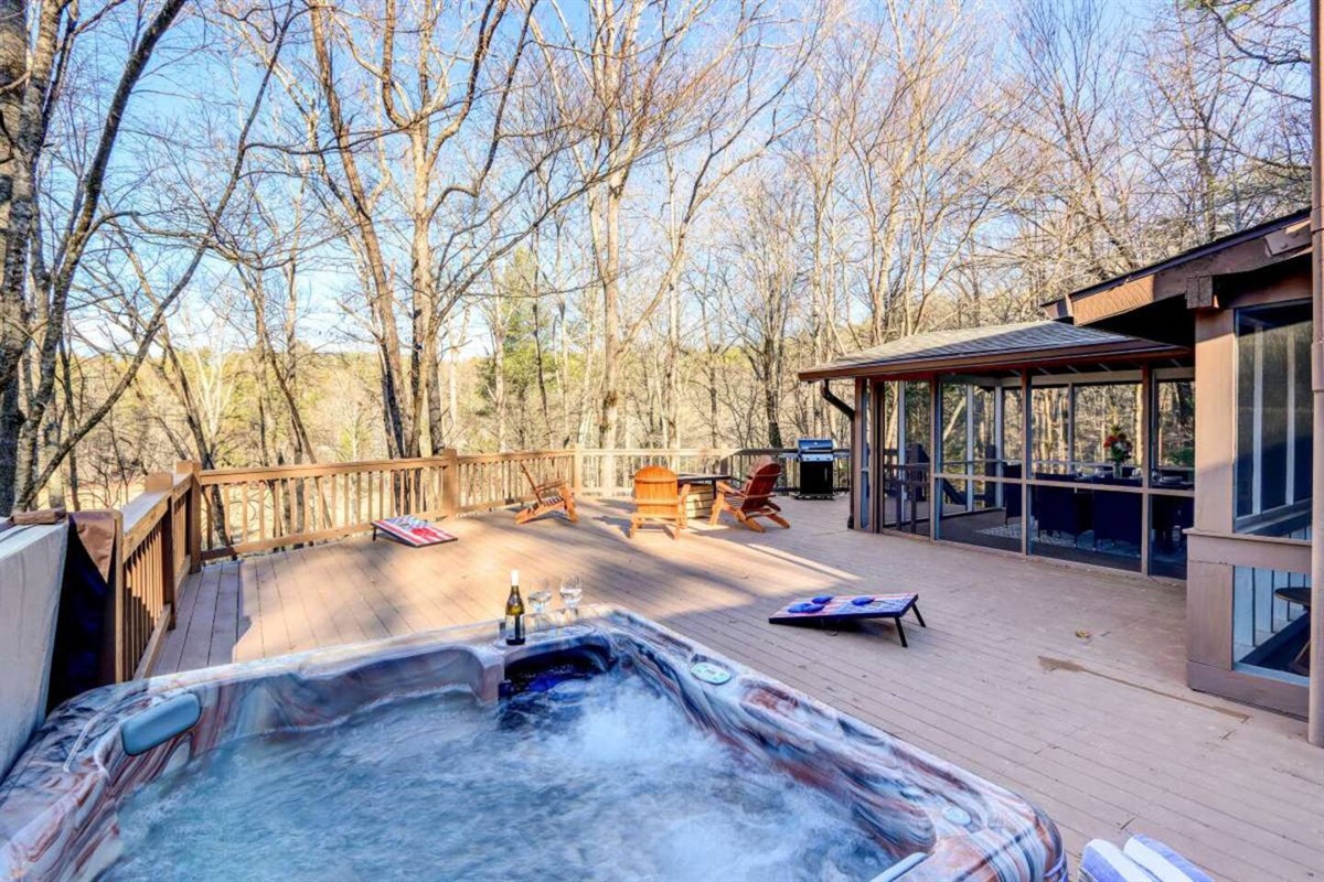 Hot tub as part of large deck at the big cabin