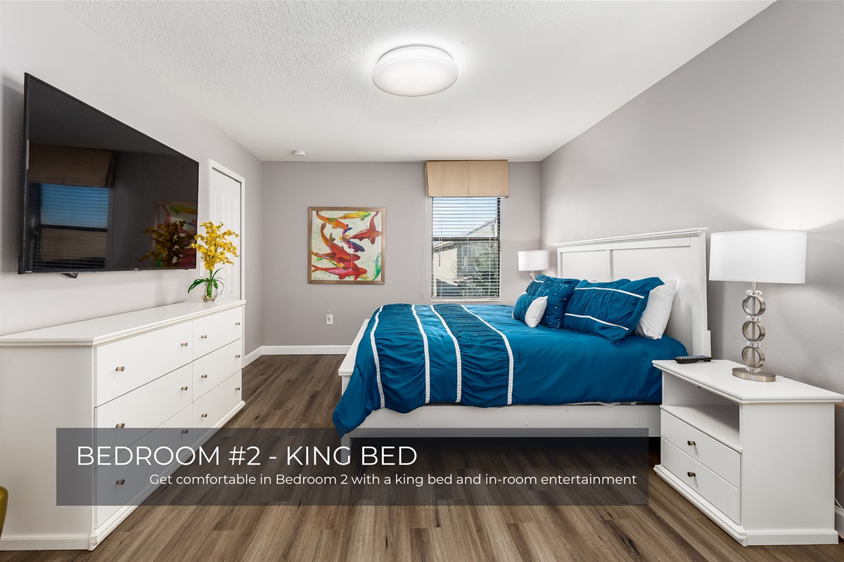 Unwind in Bedroom 2 with a cozy king bed and your favorite shows on TV