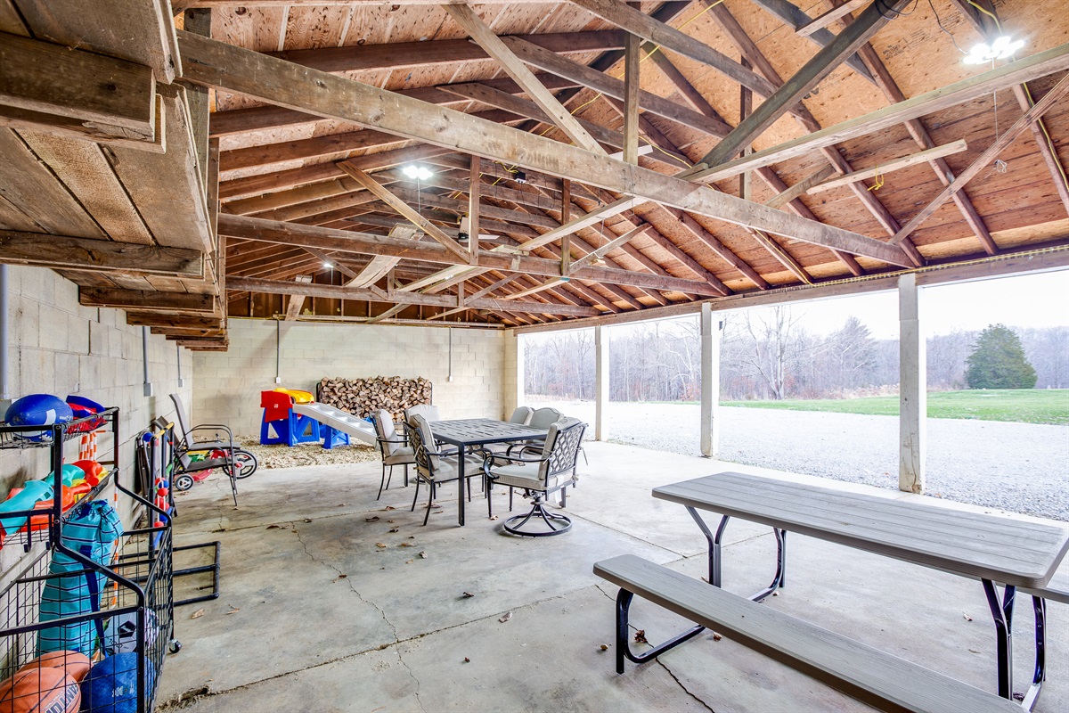 Check out all this extra outdoor living space in the game barn!